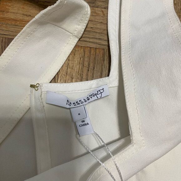 DEREK LAM 10 CROSBY
Maru Button Accent Cutout Romper In Soft White - Picture 6 of 8